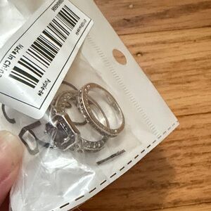 Silver Tone Ring Set - purple Stones size 6 rings. 2pack